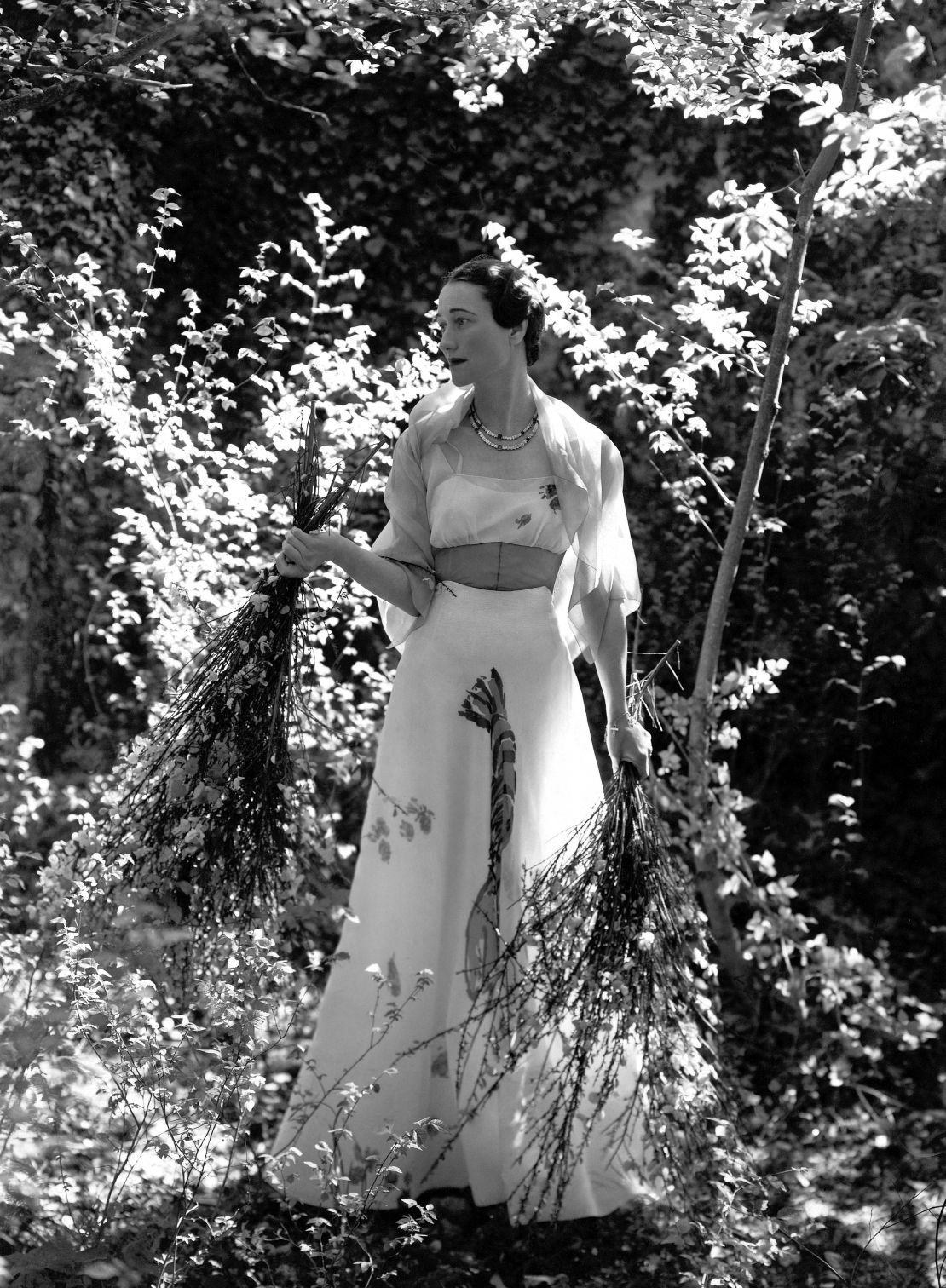 The Duchess of Windsor wearing a white Schiaparelli dress.