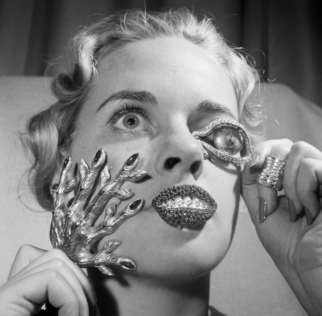 Madelle Hegeler shows off jewelry by Salvadore Dali in New York.