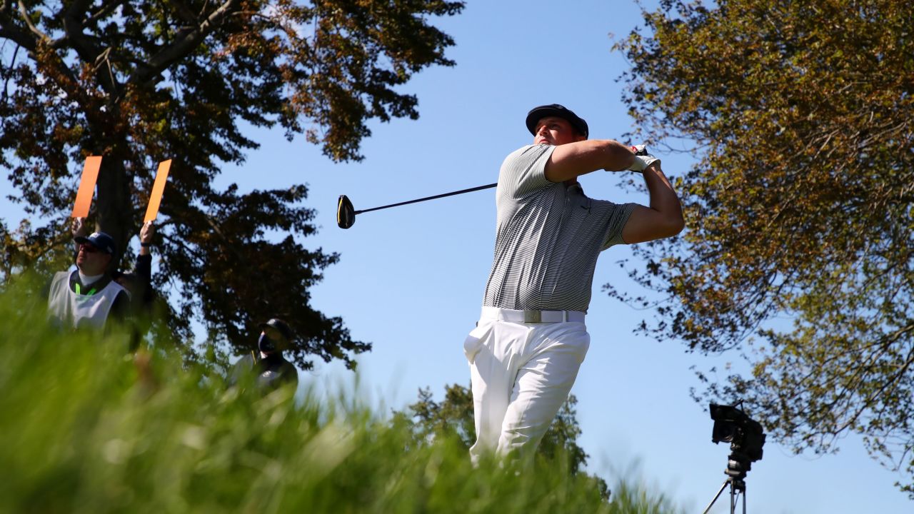 DeChambeau plays his shot from the ninth tee during the final round of the 120th US Open on September 20, 2020.