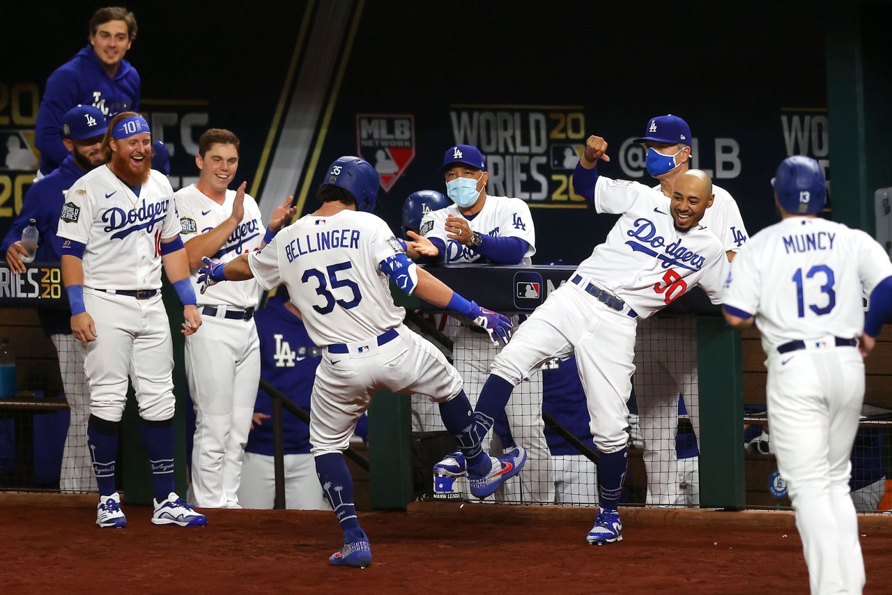 Cody Bellinger and Mookie Betts celebrate after Bellinger's fourth inning home run.