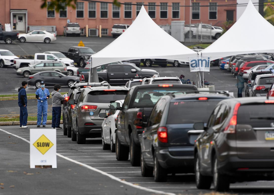 People in cars wait in line for Covid-19 testing in Reading, Pennsylvania, earlier this month.