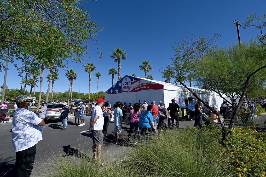People line up to vote at a shopping center on October 17, 2020 in Las Vegas.