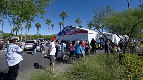 People line up to vote at a shopping center on October 17, 2020 in Las Vegas.
