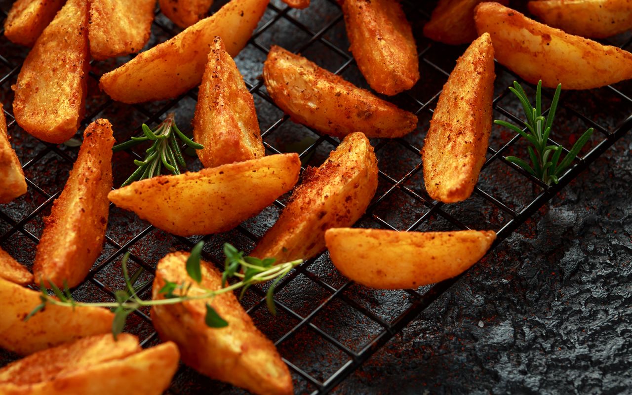 <strong>Potato wedges, Australia: </strong>Potato wedges are as advertised. A wedge of potato baked or, more commonly, fried, and usually seasoned with spices including paprika. 