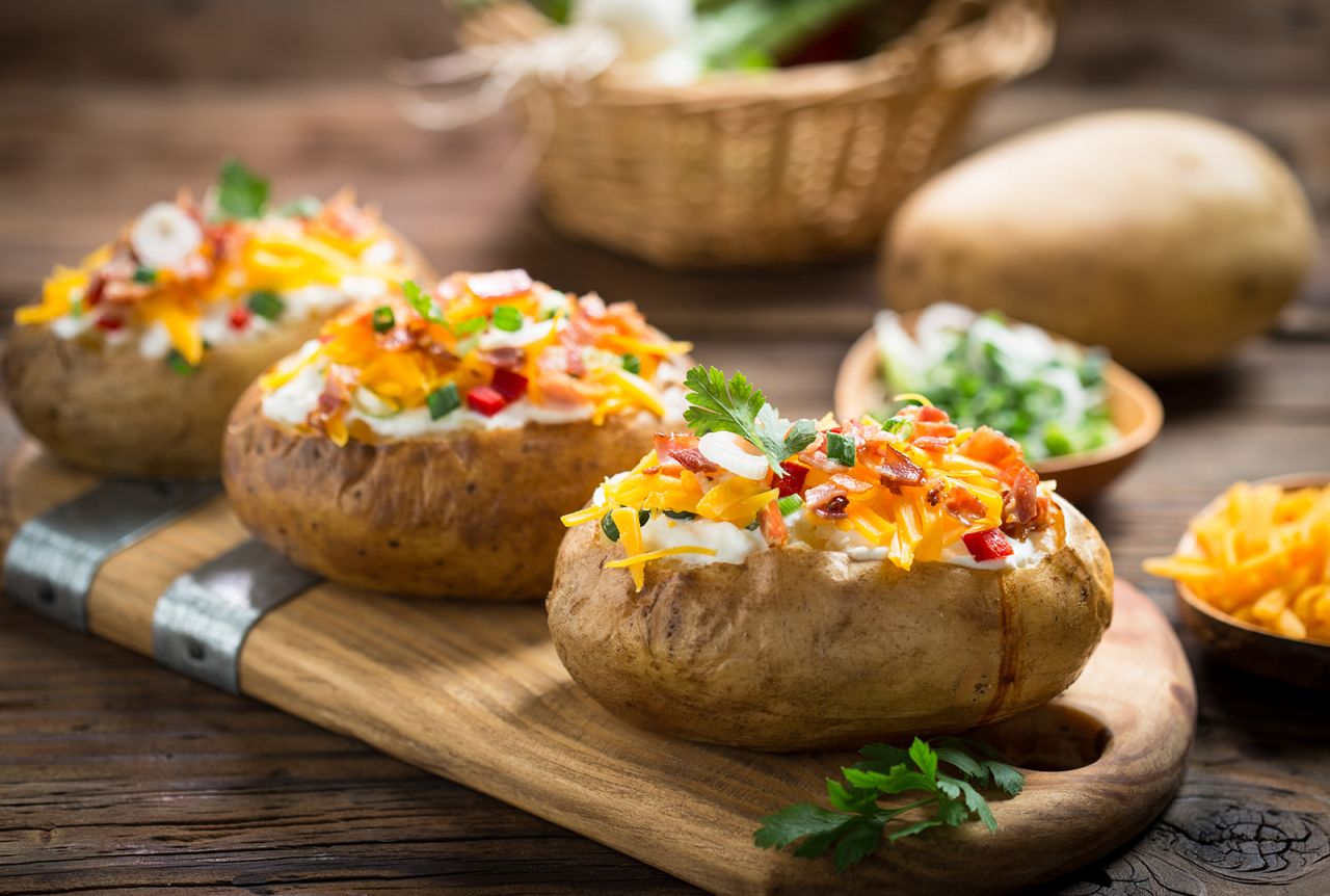 <strong>Baked potatoes: </strong>Loaded or dressed baked potatoes, on the other hand, can serve as a main meal, piled high with cheese, bacon and other calorific delights.