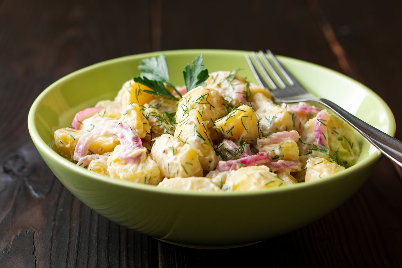 <strong>Potato salad:</strong> Potato salad may be as American as apple pie, but it's said to have arrived in the United States by way of European immigrants. Who, in turn, were introduced to the dish by Spanish explorers. 