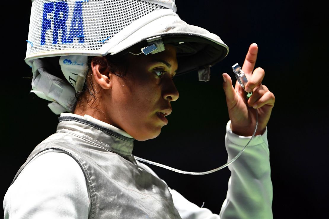 France's Ysaora Thibus reacts after losing to Russia's Aida Shanaeva in their women's individual foil quarterfinal bout at the Rio 2016 Olympic Games.