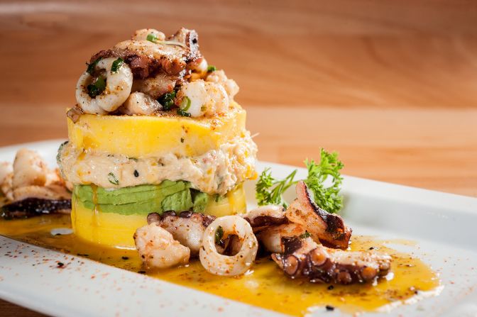 <strong>Causa rellena, Peru: </strong>Little stacks of citrusy mashed potatoes are layered with chicken or seafood, avocado and limes. 