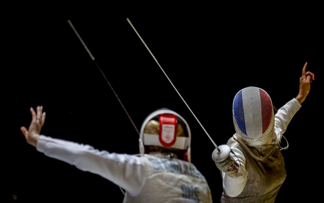Ysaora (R) vies with Russia's Deriglazova Inna during the women's semifinal of foil competition at the European Fencing Championships in Novi Sad in June 20, 2018. 