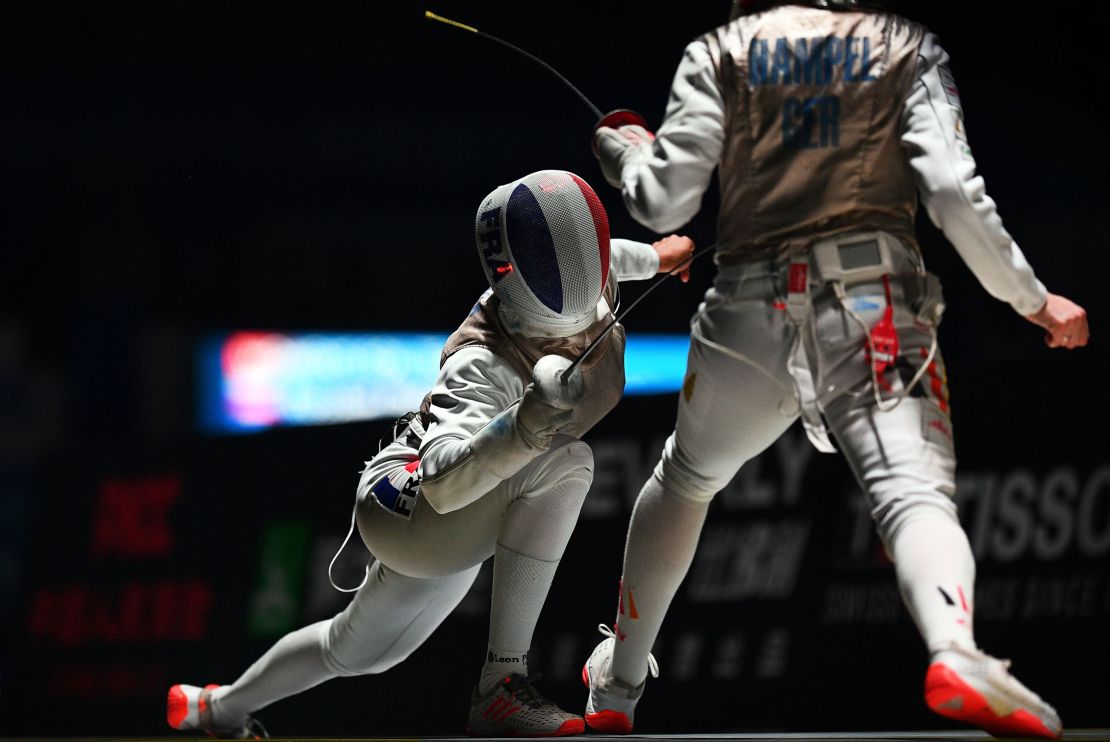 Eva Hampel of Germany (R) competes against Thibus of France during the women's foil team competition at the 2018 World Fencing Championships in Wuxi in China's eastern Jiangsu province in July 2018.