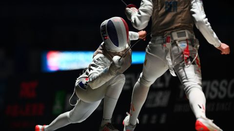 Eva Hampel of Germany (R) competes against Thibus of France during the women's foil team competition at the 2018 World Fencing Championships in Wuxi in China's eastern Jiangsu province in July 2018.