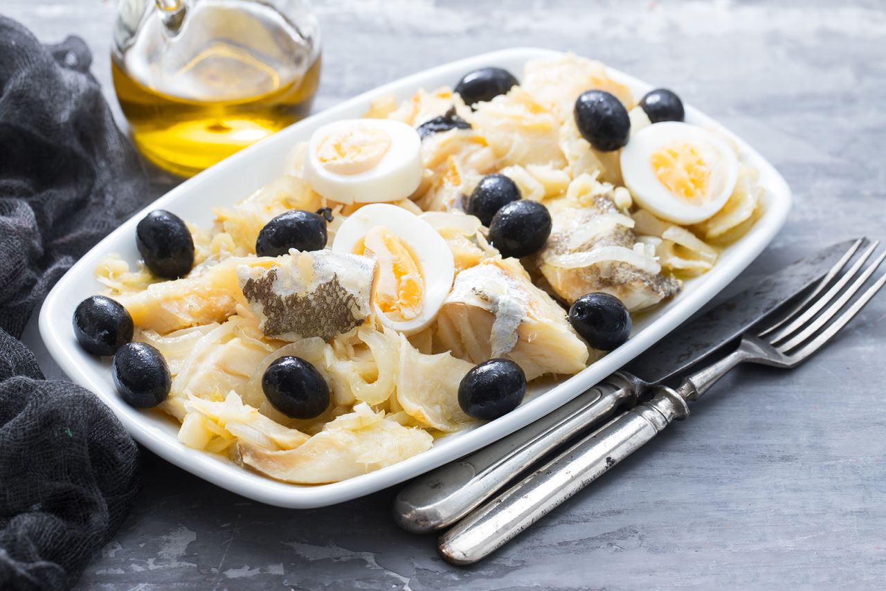 <strong>Bacalhau à Gomes de Sá, Portugal: </strong>This salt cod, onion and potato casserole is garnished with black olives and hard-boiled eggs. 