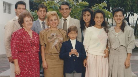 Joaquín (in gray), Alberto (child in blue) and the Perez family at Alberto's Holy Communion in Caracas in 1988.