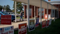 Signs are placed outside a polling location in Robersonville, North Carolina, on October 15, the first day of early voting in the state.