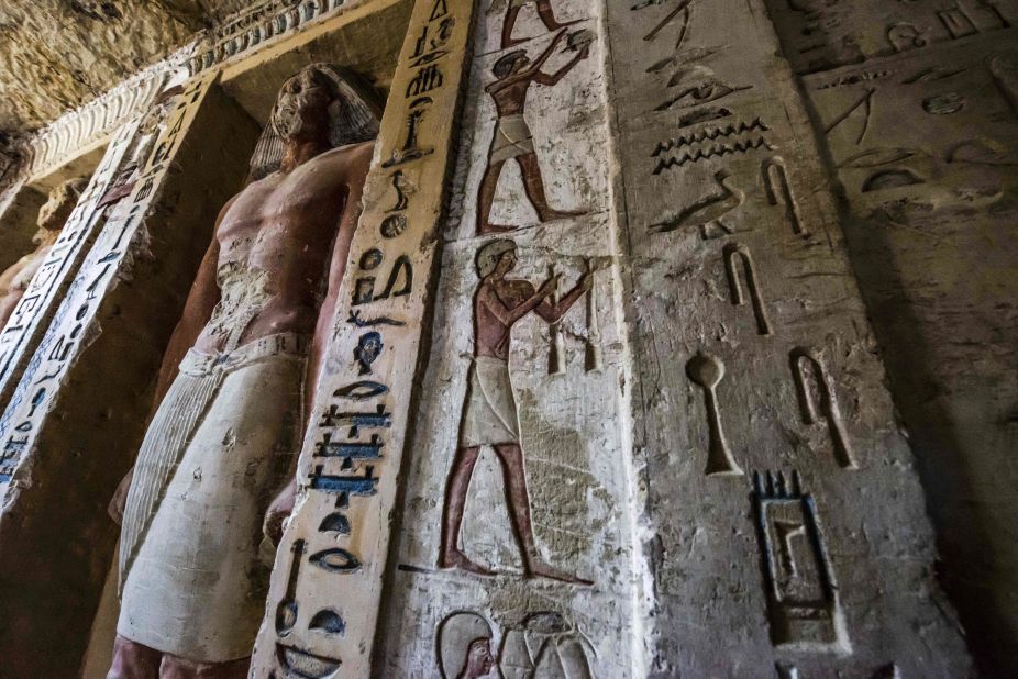Detail of the walls of the tomb, complete with carving and hieroglyphs retaining their original colors.
