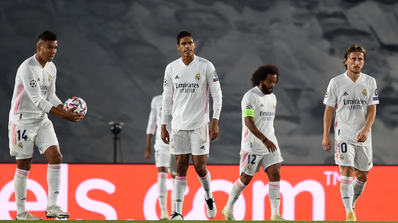 Real Madrid's players look bewildered as Shakhtar scores its third goal.