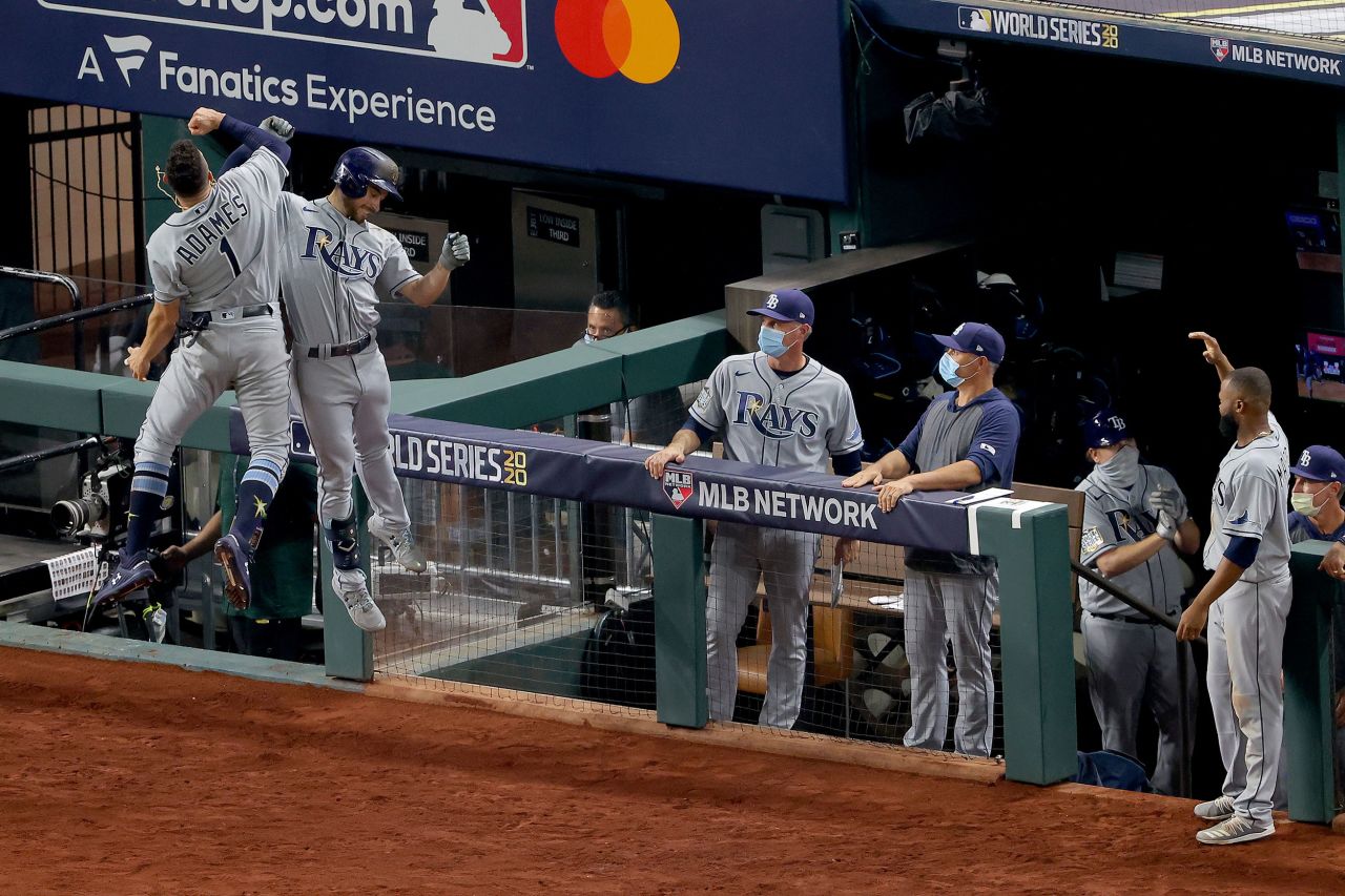 Brandon Lowe and Willy Adames celebrate after Lowe's two-run home run in the fifth inning of Game 2. Lowe hit two home runs in the game.