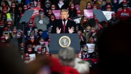 TOPSHOT - US President Donald Trump addresses supoorters during a Make America Great Again rally as he campaigns at Erie International Airport in Erie, Pennsylvania, October 20, 2020. (Photo by SAUL LOEB / AFP) (Photo by SAUL LOEB/AFP via Getty Images)