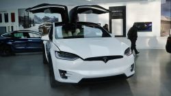 NEW YORK, NEW YORK - JANUARY 30: A tesla vehicle is displayed in a Manhattan dealership on January 30, 2020 in New York City. Following a fourth-quarter earnings report, Tesla, the electric car company, saw its stock surge to another record high Thursday that blew past estimates, giving the leading maker of electric vehicles a market valuation of $115 billion. Shares of Tesla (TSLA) rose 10.3%, closing at 640.81, a new closing high. (Photo by Spencer Platt/Getty Images)