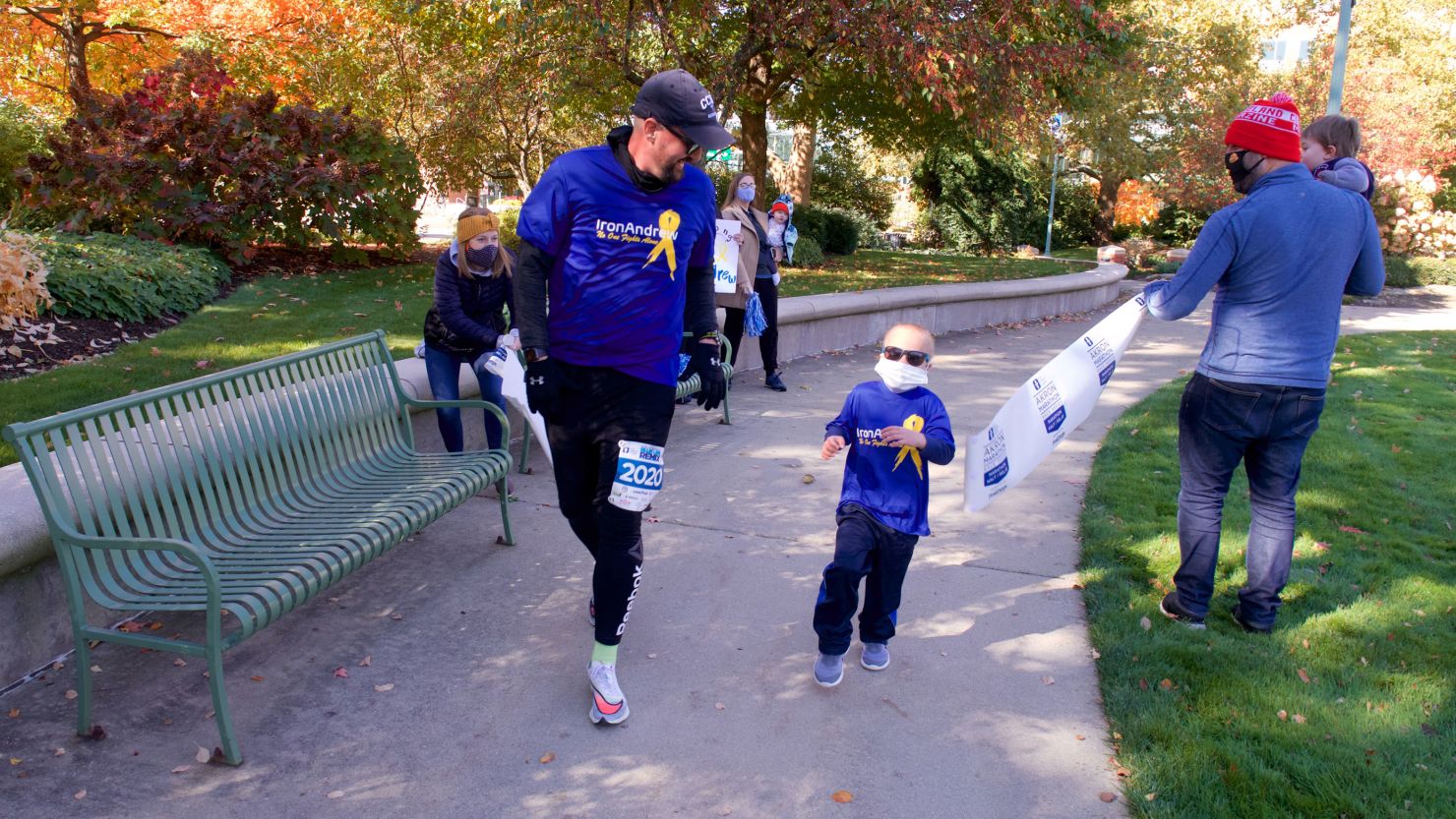An Ohio dad ran his first marathon to support his son fighting cancer and raise money for Akron Children's Hospital. 
