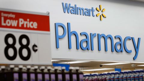 A Wal-Mart Everyday Low Price sign is displayed by the pharmacy during the grand opening of a new Wal-Mart Stores Inc. location in Torrance, California.