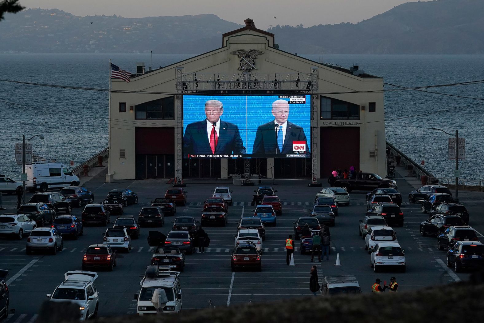 People watch the debate from their vehicles in San Francisco.