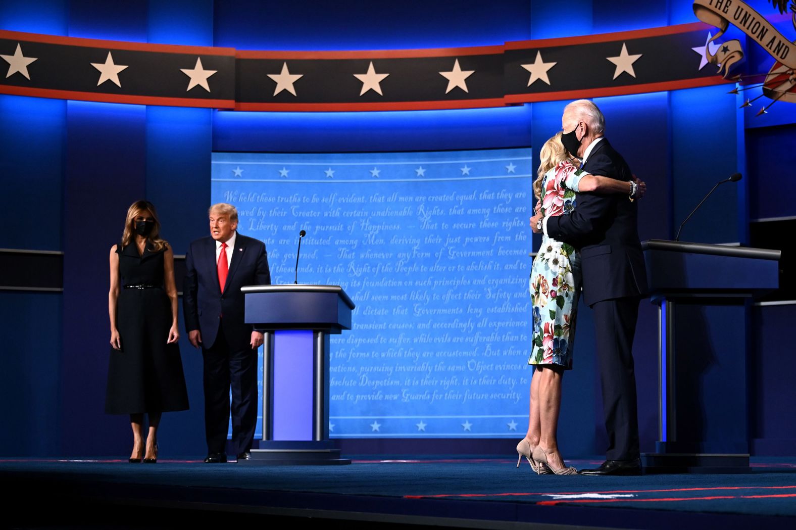 Trump and Biden are joined by their spouses at the end of the debate.