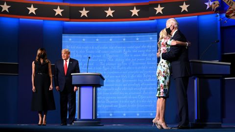 Trump and Biden are joined by their spouses at the end of the debate.