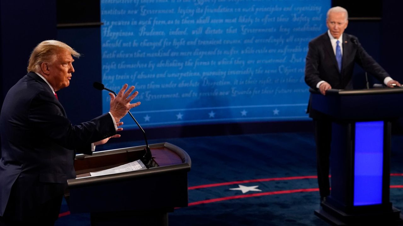 NASHVILLE, TENNESSEE - OCTOBER 22: President Donald Trump answers a question as Democratic presidential candidate former Vice President Joe Biden listens during the second and final presidential debate at Belmont University on October 22, 2020 in Nashville, Tennessee. This is the last debate between the two candidates before the election on November 3. (Photo by Morry Gash-Pool/Getty Images)