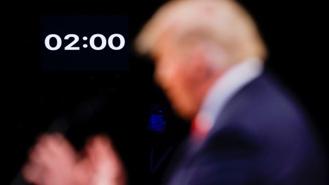 A timer is shown near Trump. Each candidate got two uninterrupted minutes to speak at the start of each debate segment.