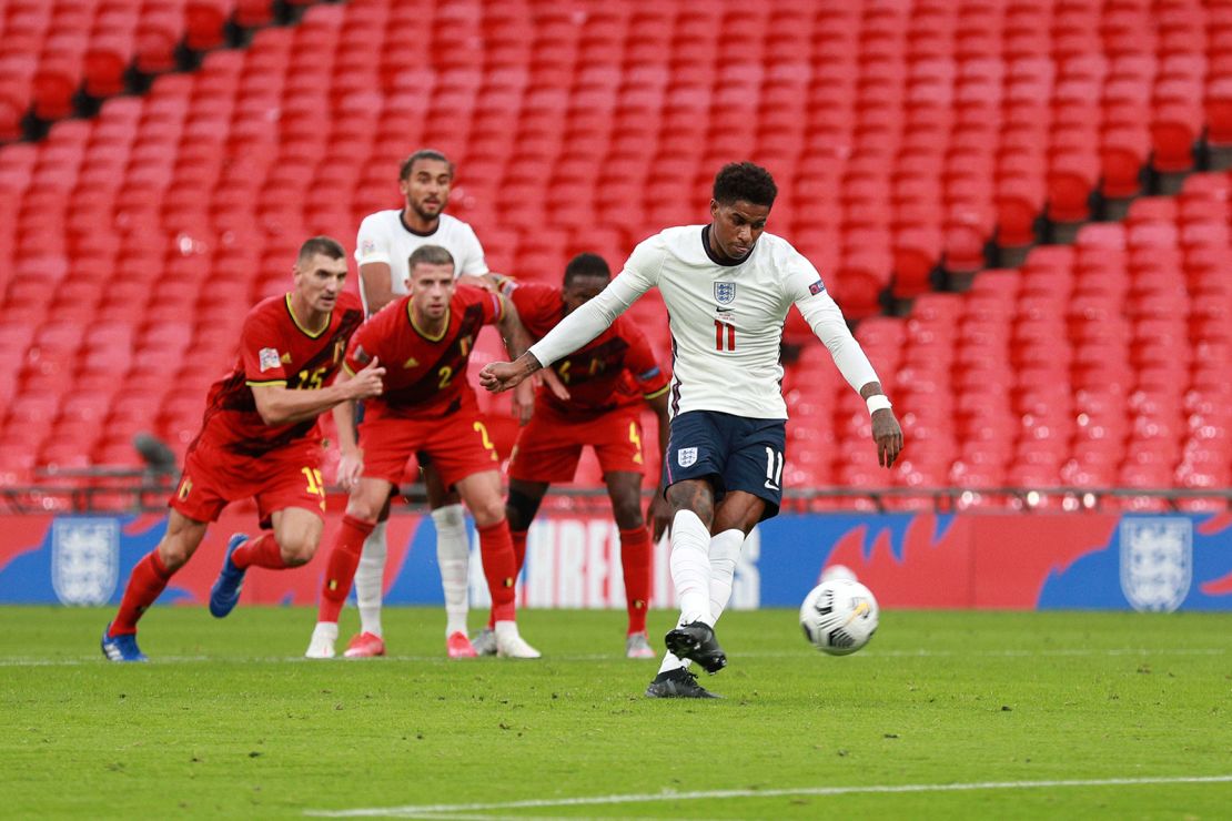 Rashford scores a penalty against  Belgium at Wembley Stadium.