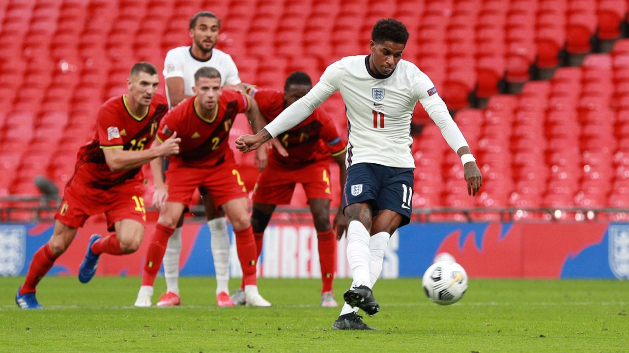 Rashford scores a penalty against Belgium at Wembley Stadium.