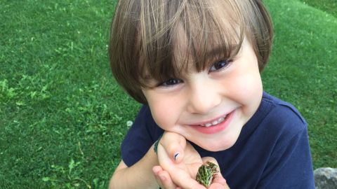 Noah's mom says he loves to go out and find frogs in the back yard. He makes a place with water and rocks for them to hang out in, observes them and then releases them near the river that runs behind the house so that they are safe from the lawn mower when his dad cuts the grass. 