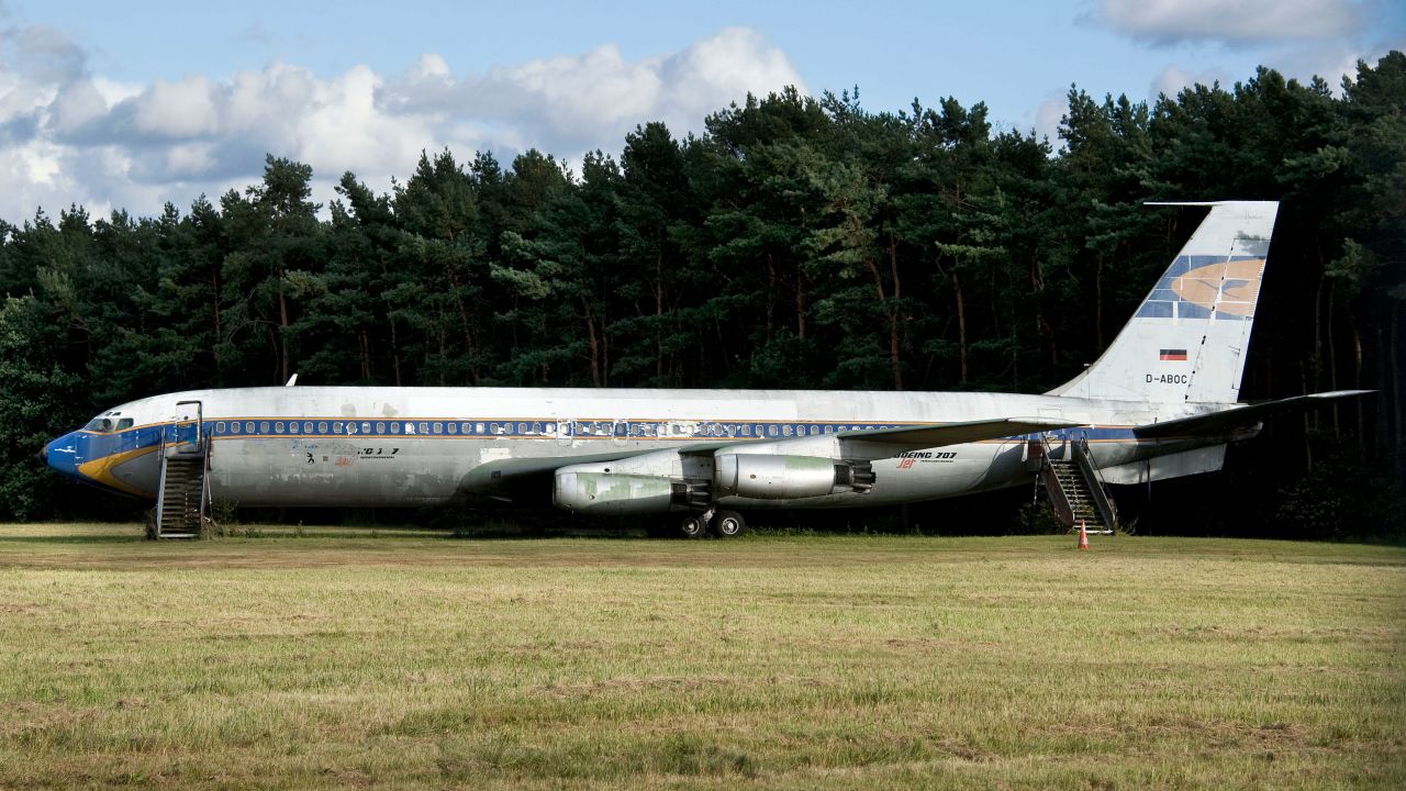 An old Boeing 707 that was presented as a gift to Lufthansa sits at the end of the runway.