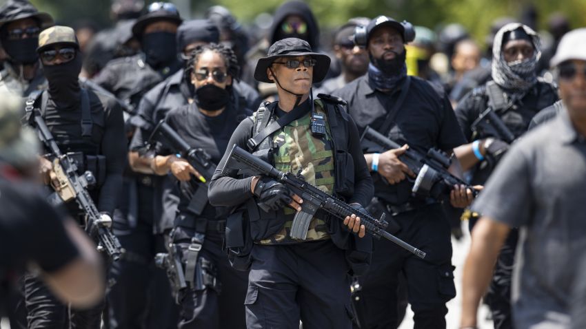 LOUISVILLE, KY - JULY 25:  Grandmaster Jay (C) leader of NFAC leads a march of his group and supporters on July 25, 2020 in Louisville, Kentucky. The group is marching in response to the killing of Breonna Taylor. (Photo by Brett Carlsen/Getty Images)