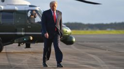 US President Donald Trump walks to board Air Force One before departing from Ocala International Airport in Ocala, Florida on October 23, 2020, after a campaign rally in The Villages, Florida. 