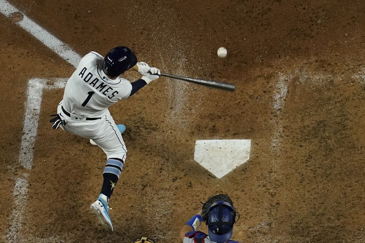 Willy Adames hits a RBI-double against the Dodgers during the fifth inning.