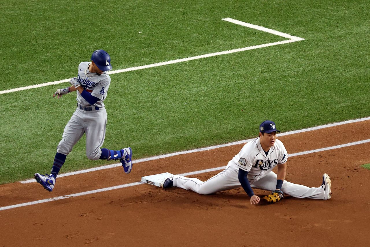 The Rays' Choi stretches to make the putout against Mookie Betts during Game 3's first inning.