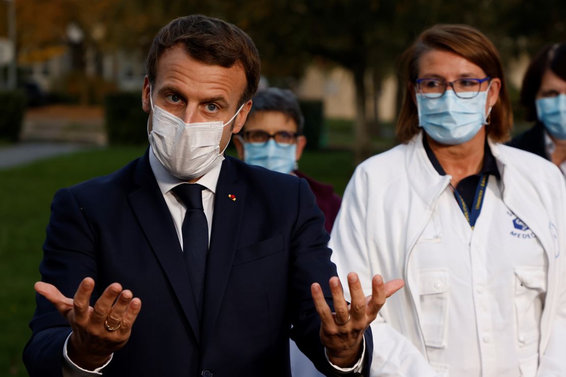 French President Emmanuel Macron speaks to the press in Pontoise, in the Val d'Oise, on October 23.