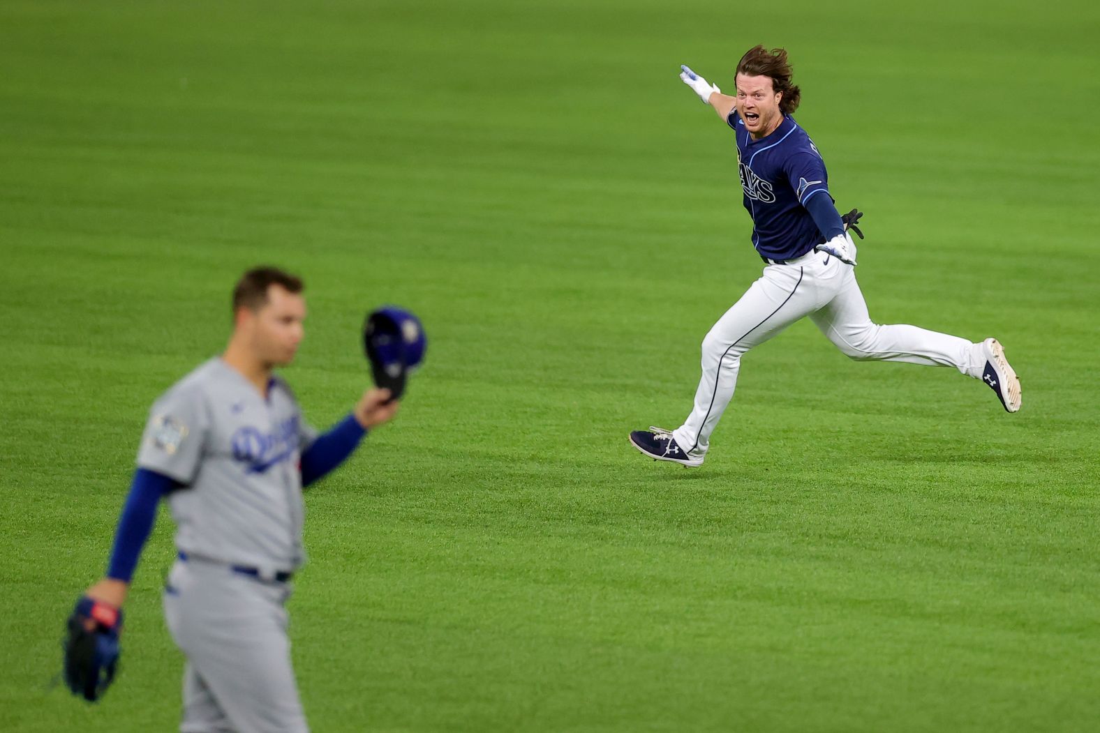 The Rays' Brett Phillips celebrates after hitting a two-run walk-off single to beat the Dodgers 8-7 in Game 4 at Globe Life Field in Arlington, Texas, on Saturday, October 24. 