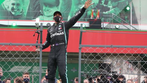 Hamilton celebrates after winning the Portuguese Grand Prix.