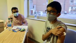 Doctors at Cincinnati Children's Hospital started vaccinating volunteers as young as 12 last week (October 16-20) as part of Pfizer's Phase 3 Covid-19 vaccine trial. Abhinav, 12, was one of them. 