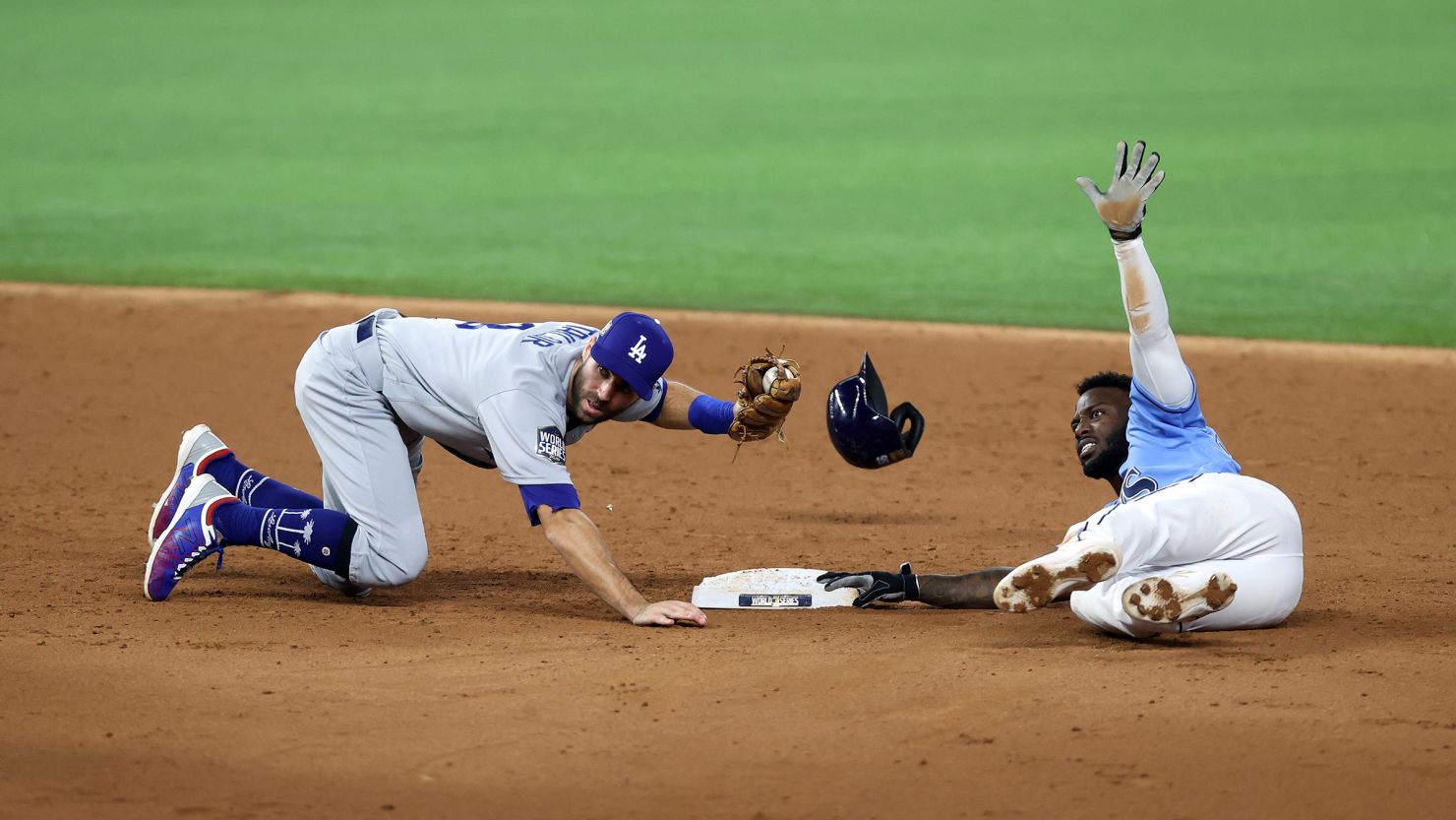 Chris Taylor of the Los Angeles Dodgers tags out Randy Arozarena of the Tampa Bay Rays during an attempt to steal second base in the third inning in Game 5 of the World Series at Globe Life Field.