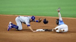 Chris Taylor of the Los Angeles Dodgers tags out Randy Arozarena of the Tampa Bay Rays stolen base attempt during the third inning in Game Five of the 2020 MLB World Series at Globe Life Field.
