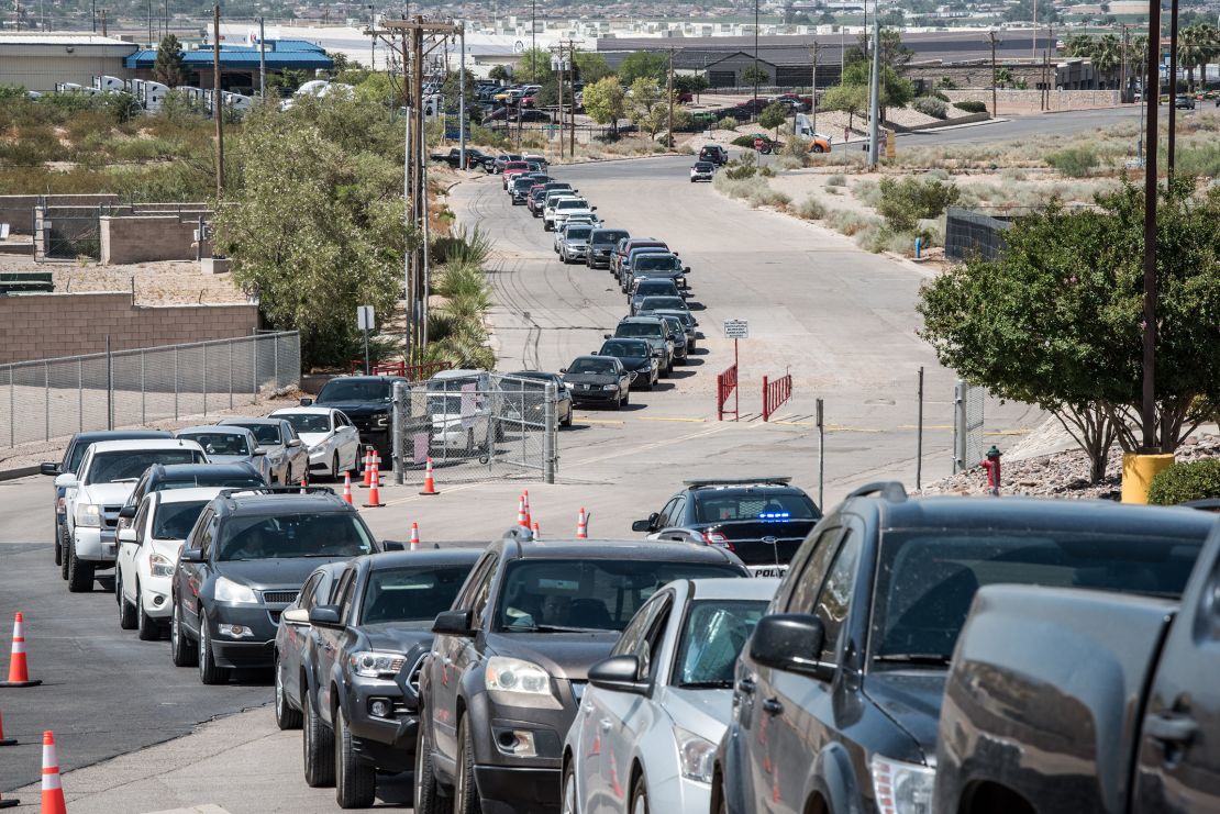 People wait to get tested at a newly opened mega drive-thru site in El Paso.