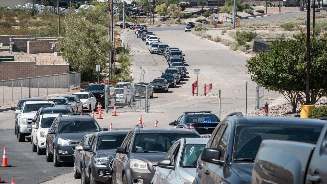 People wait to get tested at a newly opened mega drive-thru site in El Paso.