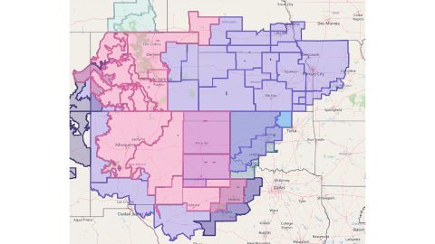Widespread winter weather warnings (pink) and advisories (purple) for snow and ice