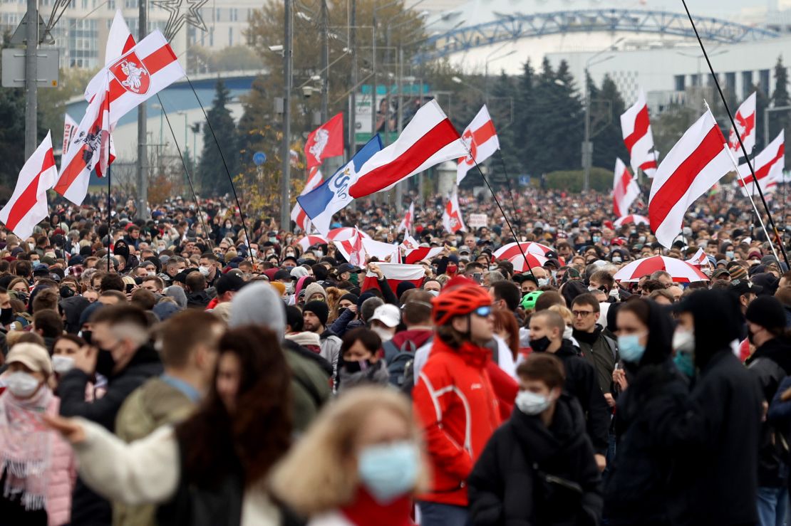 Demonstrators carried pre-Soviet white and red Belarus flags last October as they demanded Lukashenko resign after months of mass protests.