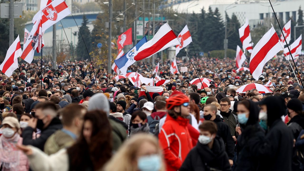 Demonstrators carried pre-Soviet white and red Belarus flags last October as they demanded Lukashenko resign after months of mass protests.