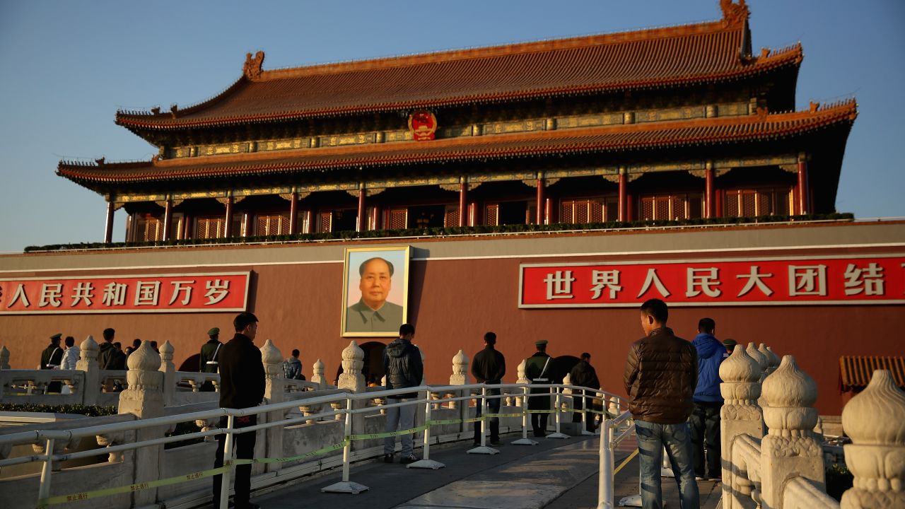 BEIJING, CHINA - NOVEMBER 12: The plainclothes policemen guard in front of Tiananmen Gate outside the Great Hall of the People where the Communist Party's 205-member Central Committee gathered for its third annual plenum on November 12, 2013 in Beijing, China. The 18th Central Committee of the Communist Party of China (CPC) approved a decision on "major issues concerning comprehensively deepening reforms" at the close of the Third Plenary Session of the 18th CPC Central Committee on Tuesday.  (Photo by Feng Li/Getty Images)